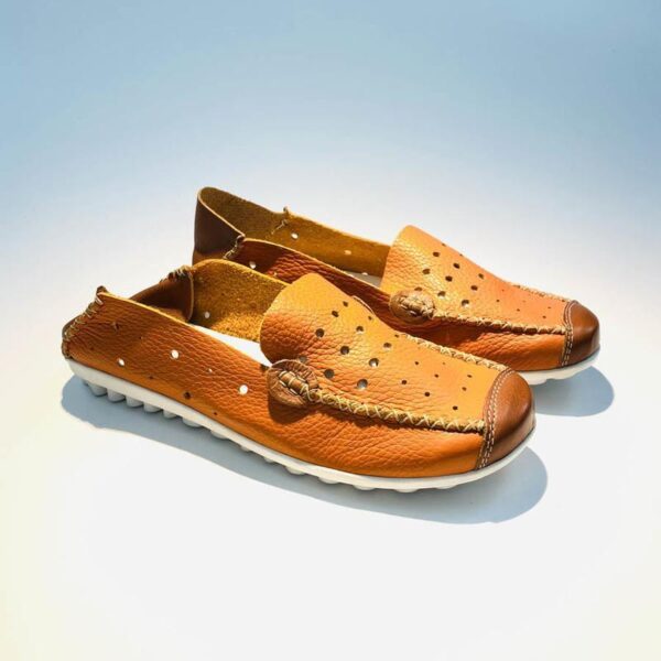 Woman's mocassin orange sabot with perforated leather and handmade rubber sole