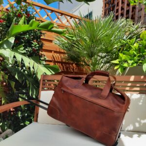 Handcrafted brown leather duffle bag with wheels made in Italy
