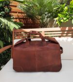 Handcrafted brown leather duffle bag with wheels made in Italy